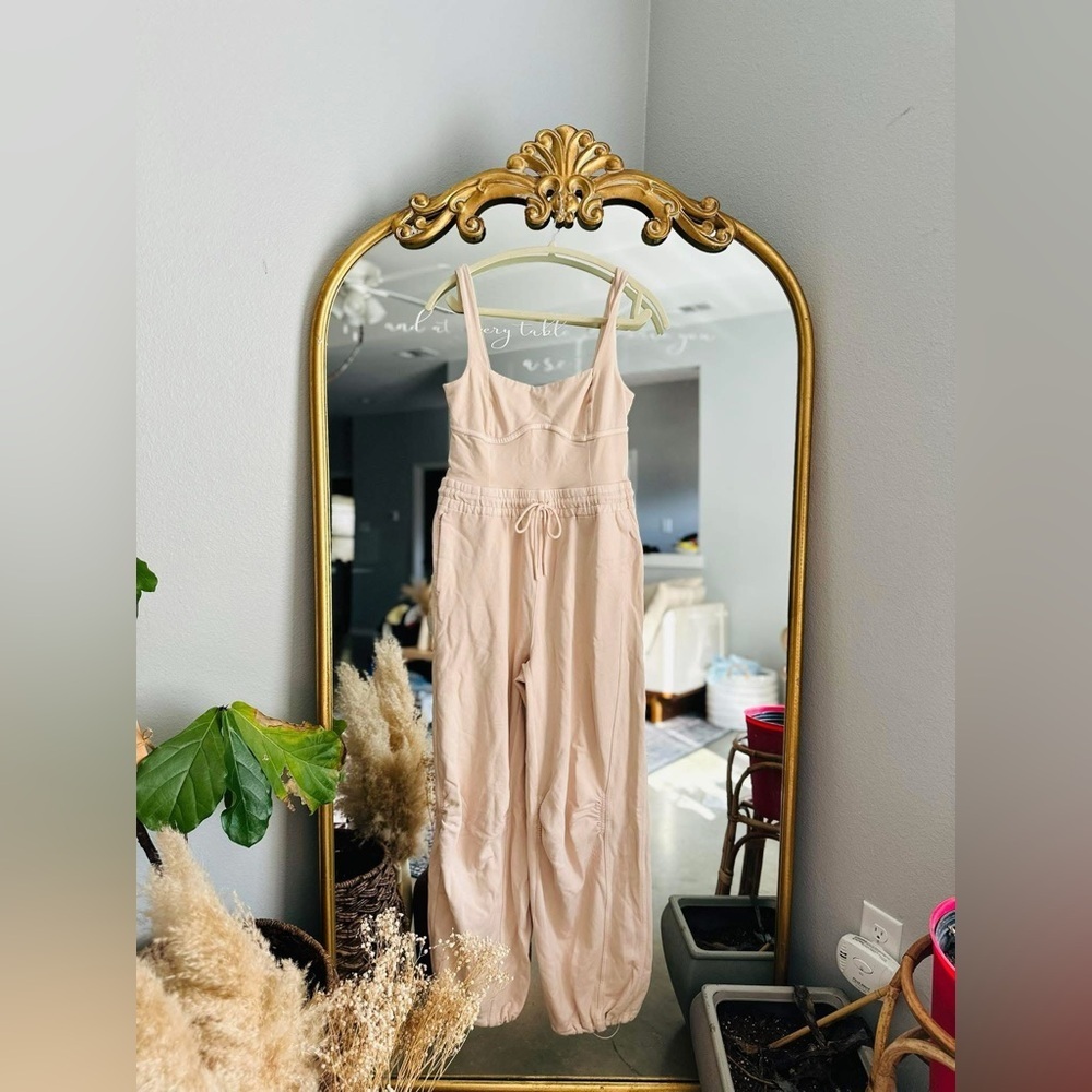 Free people movement pink cashmere in bound jumpsuit medium nwot